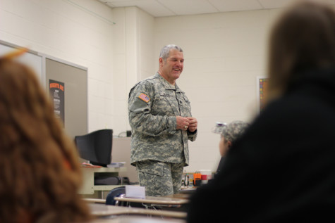 STEM Day presenter tells students about the use of science, technology, engineering, and mathematics in the military.
