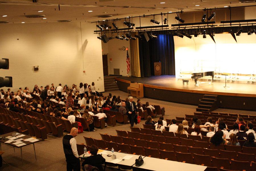 Middle school choir members await their adjudication in the MHS auditorium. -Photo by Jake Dziubla