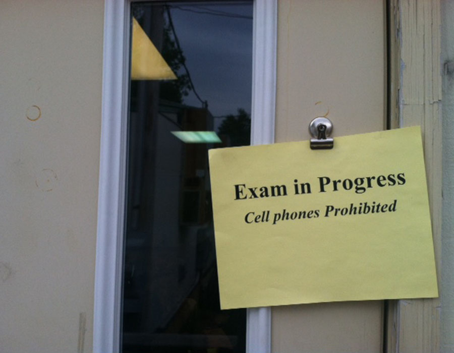 A sign is hung outside of portable four on Wednesday May 15 during the AP United States History Exam. Every year MHS seniors, juniors, and some sophomores take AP exams.