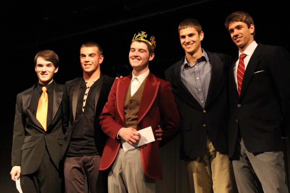 Evich freezes the other competitors in the Mr. Middletown competition