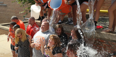 Middletown High School coaches and administration get ice water dumped on them as part of the ice bucket challenge to raise awareness and funds for ALS. ALS stands for Amyotrophic lateral sclerosis, and the challenge has helped raised over $88 million dollars for the disease.