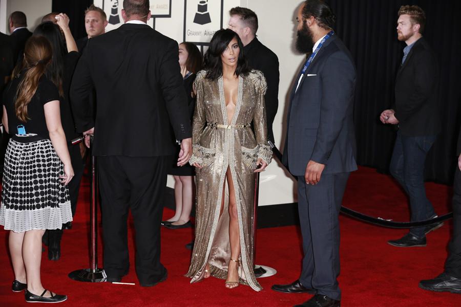 Before she went blond, Kim Kardashian arrives at the 57th Annual Grammy Awards at Staples Center in Los Angeles on Sunday, Feb. 8, 2015.