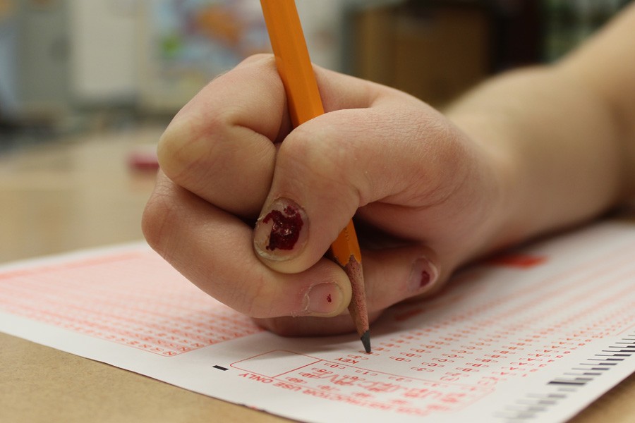 A student takes a standardized test during second block. 