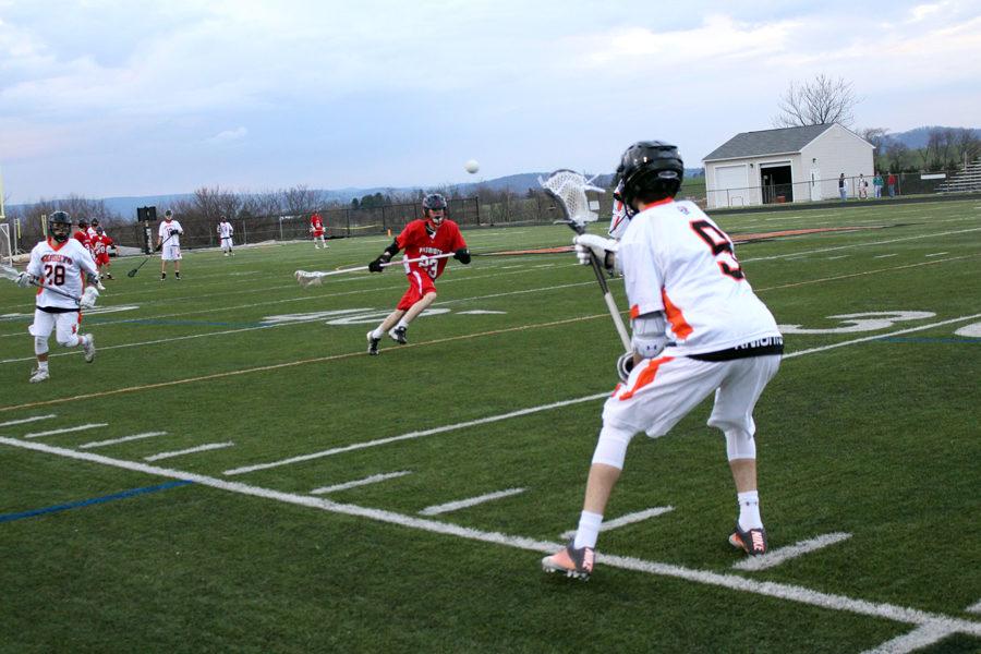 After being passed the ball, Andrew Ceresini prepares to head toward the goal. Middletown ended the once-close game, 20-5, surpassing Thomas Johnson High School.