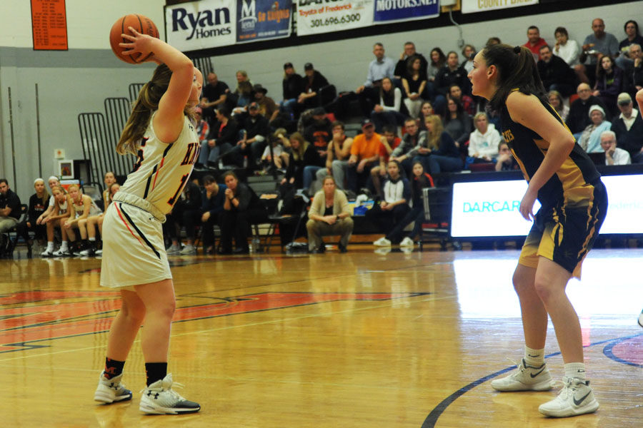 MHS junior Molly Faron attempts a pass against South Carroll High School.